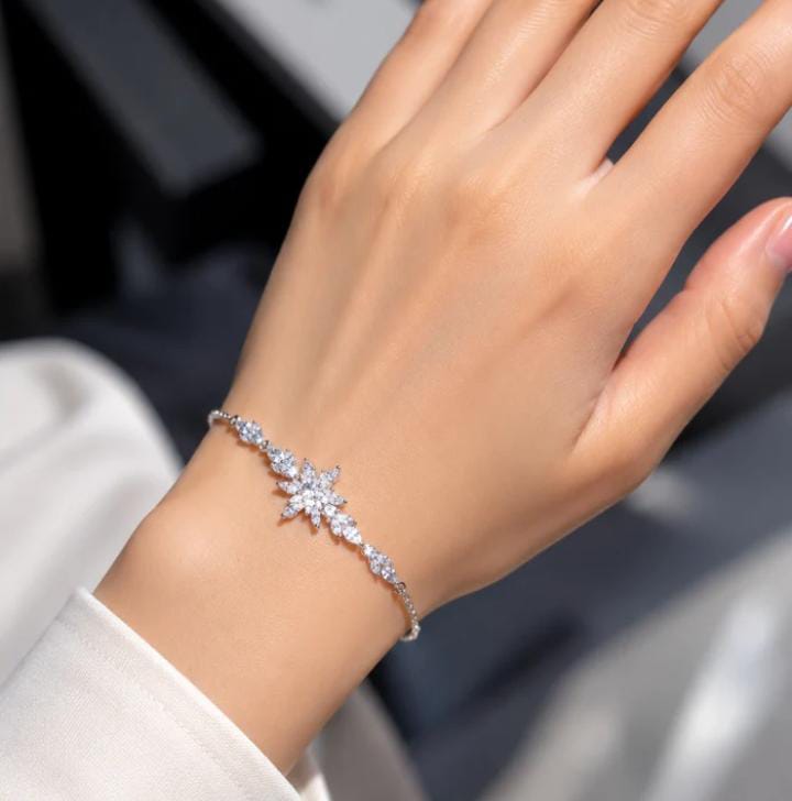 Radiant Silver Starburst Bracelet worn on wrist